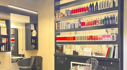 Shelf of premium beauty products at Platinum Black Ladies Salon in Dubai, AE.