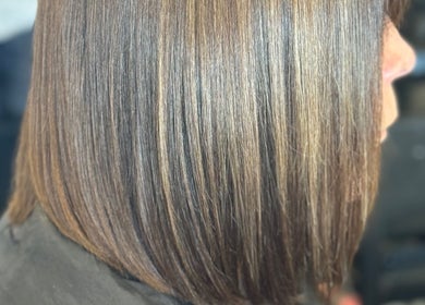 Sleek bob haircut by Friel Good Hair in Glasgow, Scotland, GB, showcasing smooth and shiny hair strands.