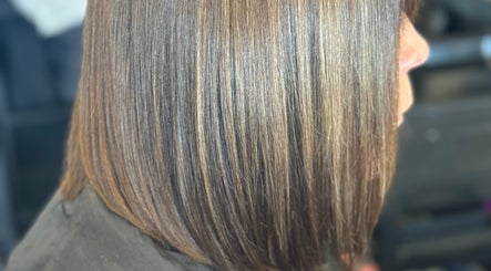 Sleek bob haircut by Friel Good Hair in Glasgow, Scotland, GB, showcasing smooth and shiny hair strands.