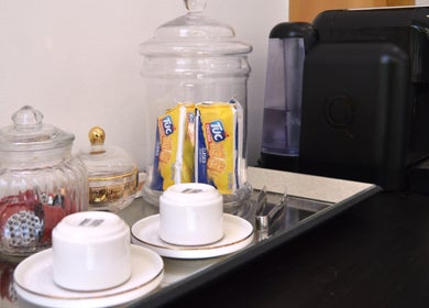 Coffee setup with snacks at Jorge Rodriguez Cabelereiro OLI Organic, Lisboa, Lisboa, PT.