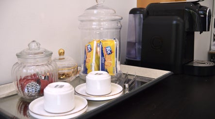 Coffee setup with snacks at Jorge Rodriguez Cabelereiro OLI Organic, Lisboa, Lisboa, PT.