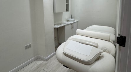Luxurious massage tables at Miche in London, England, GB, offering a tranquil wellness experience.
