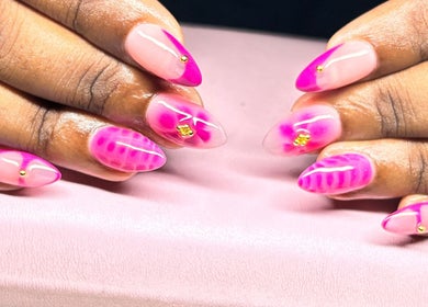 Vibrant pink nail art at The Nail Spa, Kingston, St. Andrew Parish, JM showcasing artistry and style.