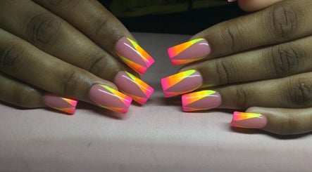 Vibrant neon nail art at The Nail Spa, Kingston, St. Andrew Parish, JM, showcasing colorful manicure skills.