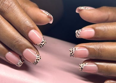 Elegant leopard print nail art at The Nail Spa, Kingston, St. Andrew Parish, JM.
