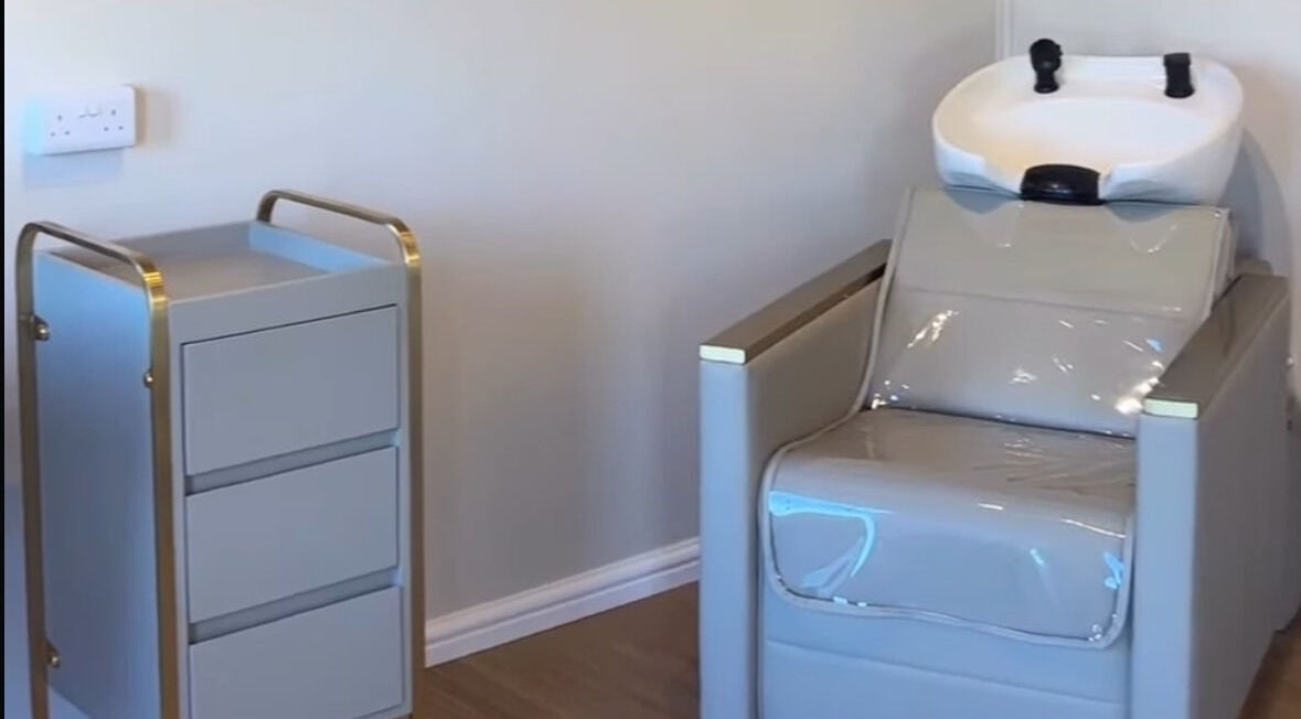 Luxurious shampoo station at Salon Palm, Billericay, England, GB showcasing premium hair care.