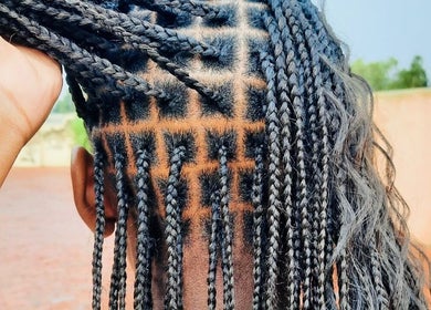 Intricate braided hairstyle at Allure Beauty Bar in Springs, Gauteng, ZA showcasing expert technique.