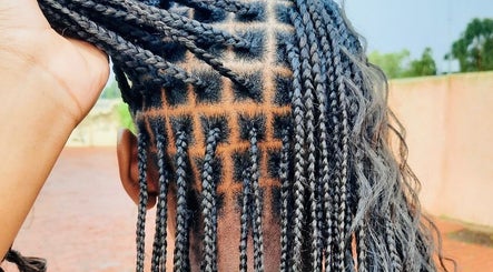 Intricate braided hairstyle at Allure Beauty Bar in Springs, Gauteng, ZA showcasing expert technique.