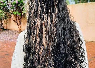 Intricate braids at Allure Beauty Bar, Springs, Gauteng, ZA, showcasing stunning hair artistry.