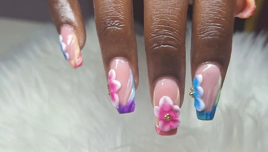 Elegant floral nail art at Rachella Creations in Oistins, Christ Church, BB. Perfect for a stylish manicure.