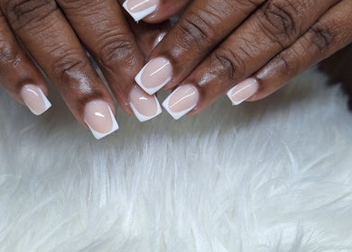 Beautiful French manicure at Rachella Creations, Oistins, Christ Church, BB. Perfectly styled nails close-up.
