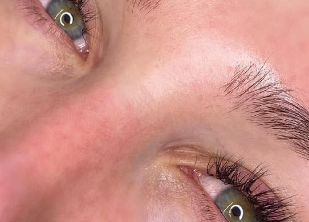 Close-up of groomed eyebrows and lashes at MVTbeautyxo, Little Hallingbury, England, GB.