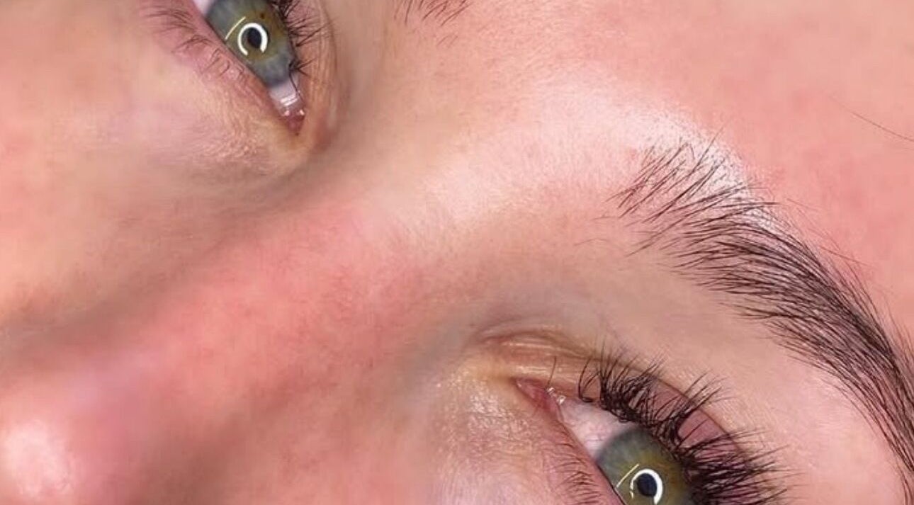 Close-up of groomed eyebrows and lashes at MVTbeautyxo, Little Hallingbury, England, GB.