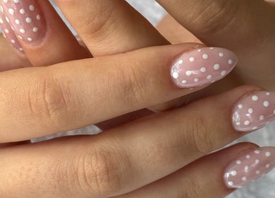 Chic polka dot nail art at Aura by Georgia in Lyme Regis, England, GB.