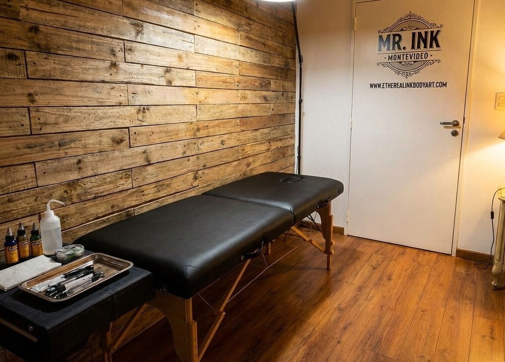 Elegant tattoo studio at ETHEREAL INK BODY ART, Brant, Ontario, CA, featuring cozy decor and professional setup.