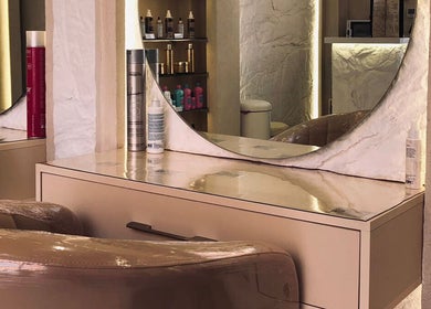 Elegant salon station at Phoebe, Marrakech, Marrakech-safi, MA, featuring sleek design and premium hair products.
