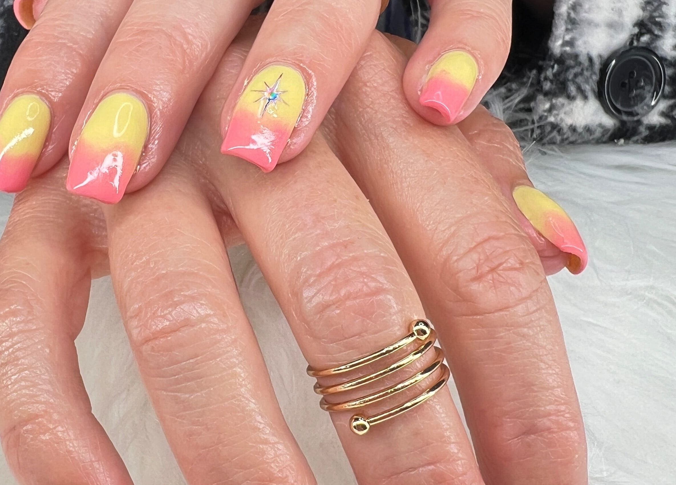 Vibrant pink and yellow gradient nails at Bougie Nails with G, Santa Maria, California, US.