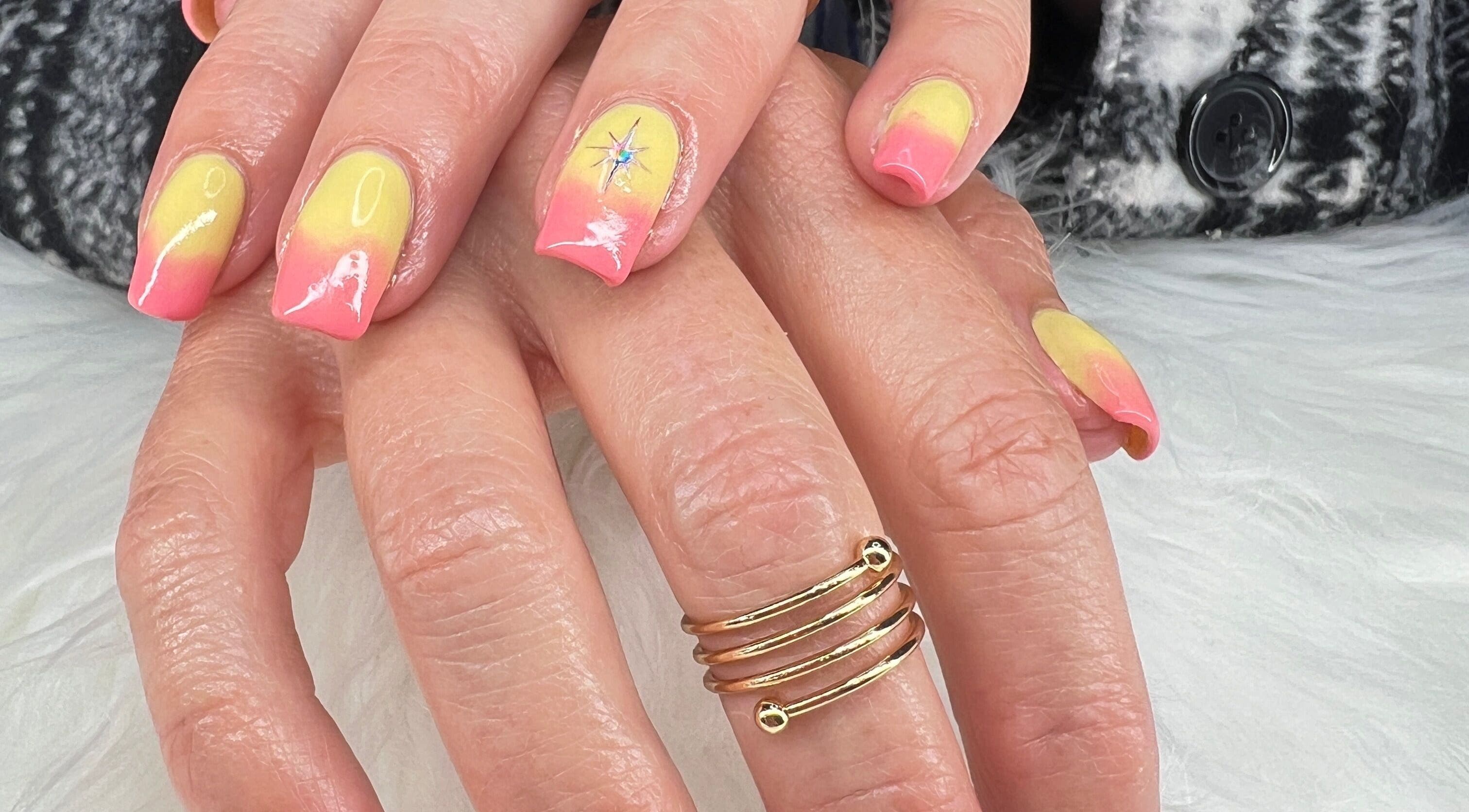 Vibrant pink and yellow gradient nails at Bougie Nails with G, Santa Maria, California, US.