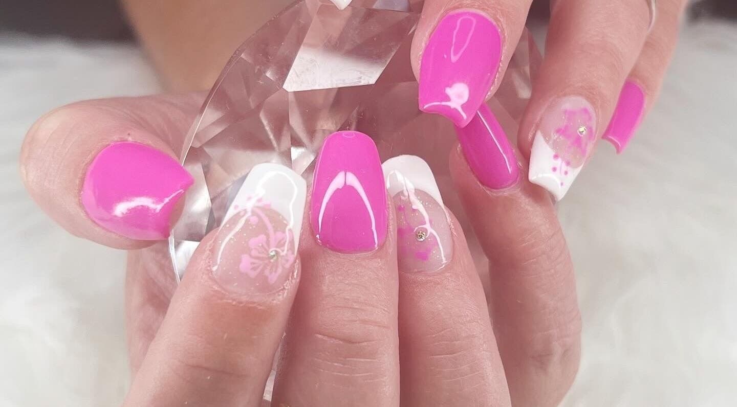 Vibrant pink and white nail art at Bougie Nails with G, Santa Maria, California, US.