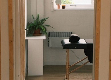Peaceful massage room at Wellbeing with Lucy, Birkenhead, England, GB, with a serene ambiance and cozy decor.