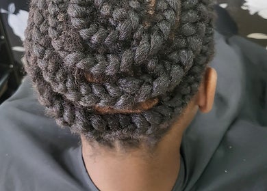 Intricate braided hairstyle at Take Down & Detangle, Cardiff, Wales, GB.
