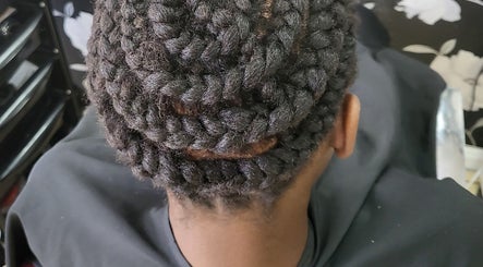 Intricate braided hairstyle at Take Down & Detangle, Cardiff, Wales, GB.