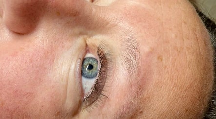 Close-up of a relaxed eye post-treatment at Muir Nior, Scarborough, England, GB showcasing smooth skin.