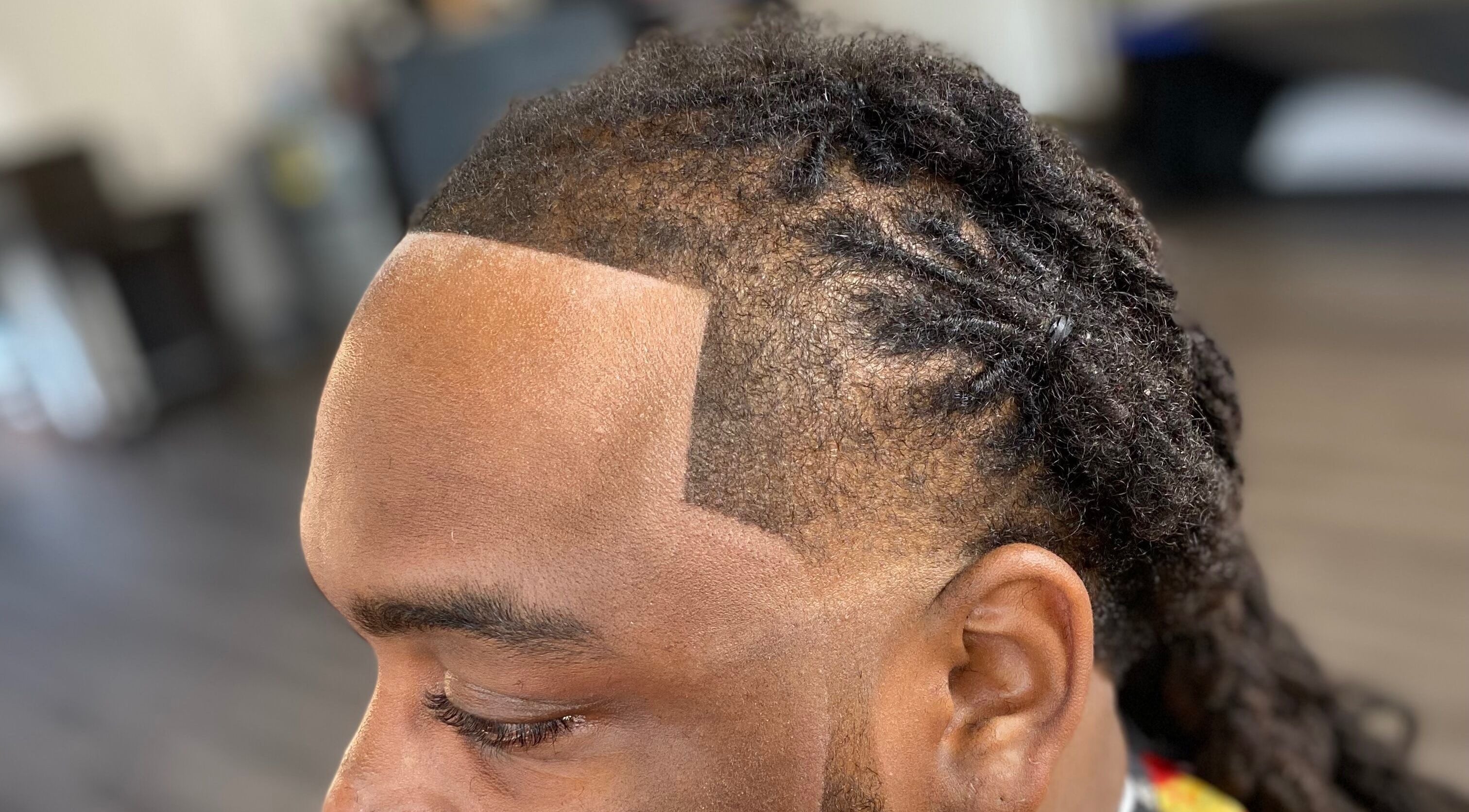 Close-up of a precision hairline style at Xclusive The Barbering Lounge LLC, Chicago, Illinois, US.