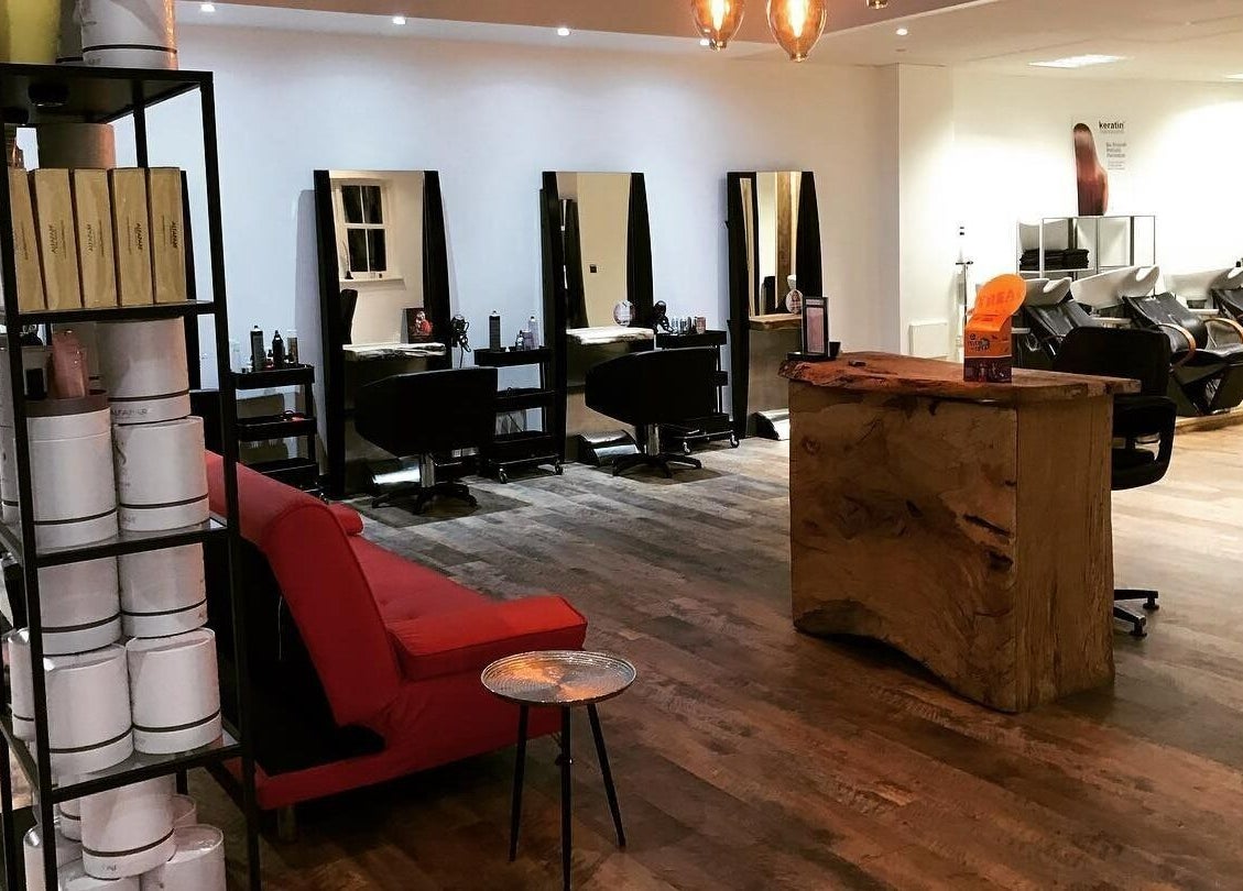 Hairology's stylish salon interior in Carlow, County Carlow, IE, featuring modern decor and inviting seating.