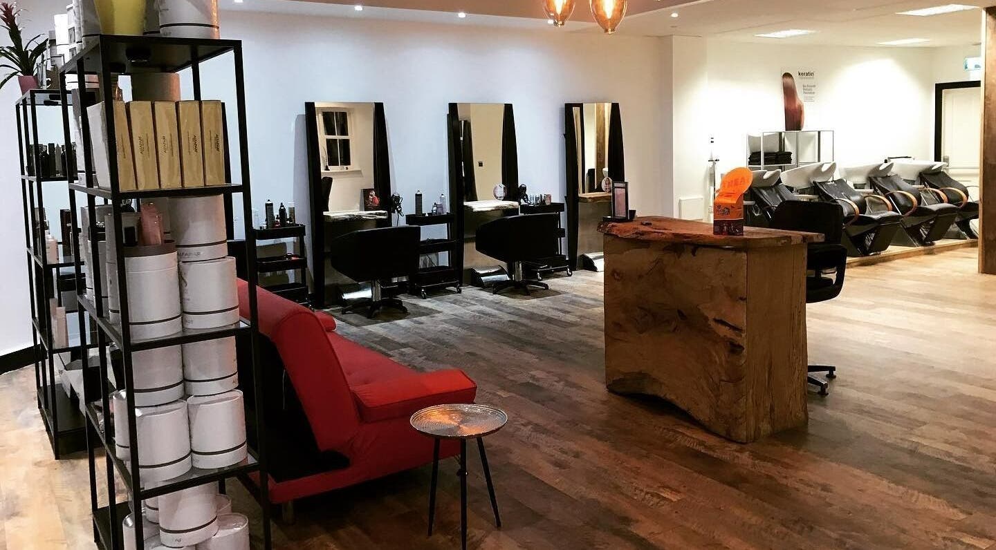 Hairology's stylish salon interior in Carlow, County Carlow, IE, featuring modern decor and inviting seating.