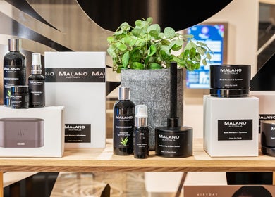 Luxury skin products displayed at Sharkra Medi Spa & Laser Clinic in Hobart, Tasmania, AU surrounded by greenery.