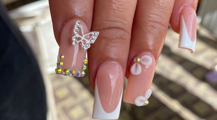 Dazzling butterfly nail art at Nail Odyssey, Arima, Arima Borough Corporation, TT.
