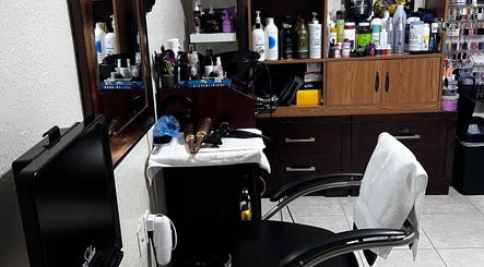 Stylish station at Dayami Glam, Miami, Florida, US with a sleek chair and beauty products on display.