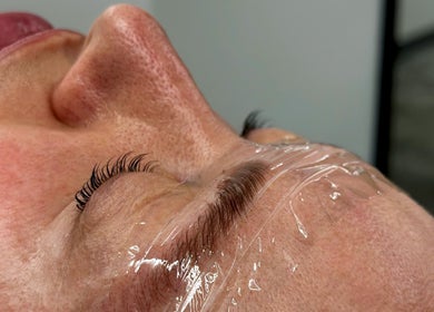 Glam Lashes NYC in New York, US offers a rejuvenating eye treatment enhancing lash beauty under plastic wrap.
