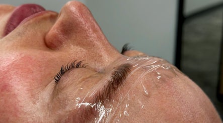 Glam Lashes NYC in New York, US offers a rejuvenating eye treatment enhancing lash beauty under plastic wrap.
