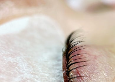 Close-up of eyelash extensions at Glam Lashes NYC in New York, New York, US, showcasing expert application.