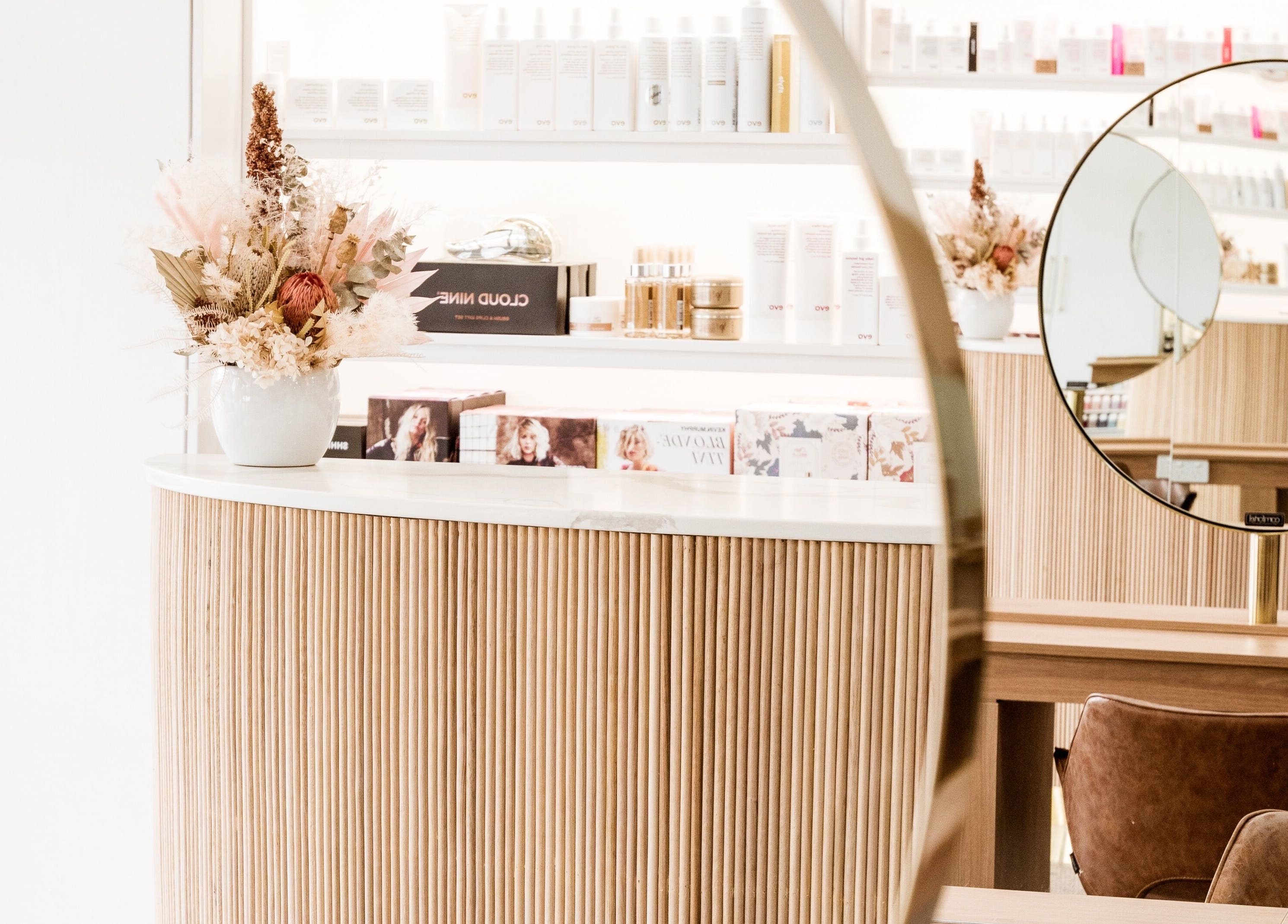 Elegant salon interior at Nuova U Salon, Mount Pleasant, Western Australia, featuring modern decor and products.