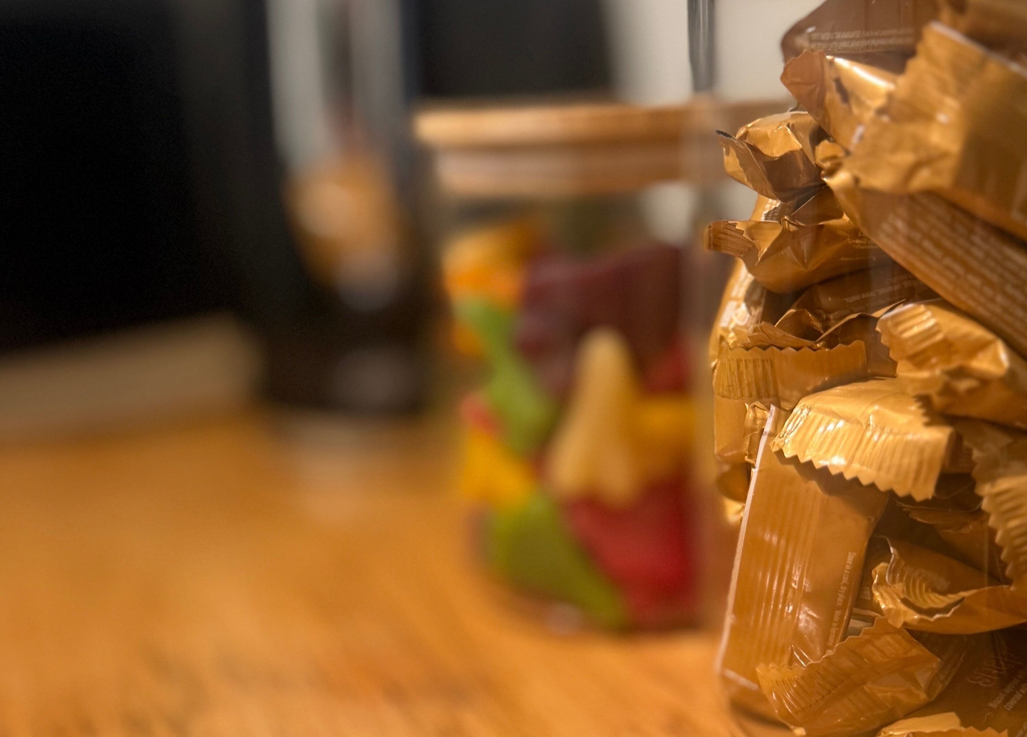 Golden candy jar at The Studio, Paraparaumu Beach, Wellington Region, NZ, showcasing delightful treats.