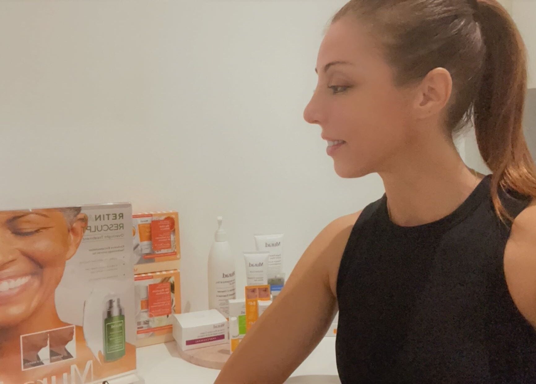 Aesthetic expert at Derma Matrix Aesthetics in Roselands, NSW, AU preparing skincare products.