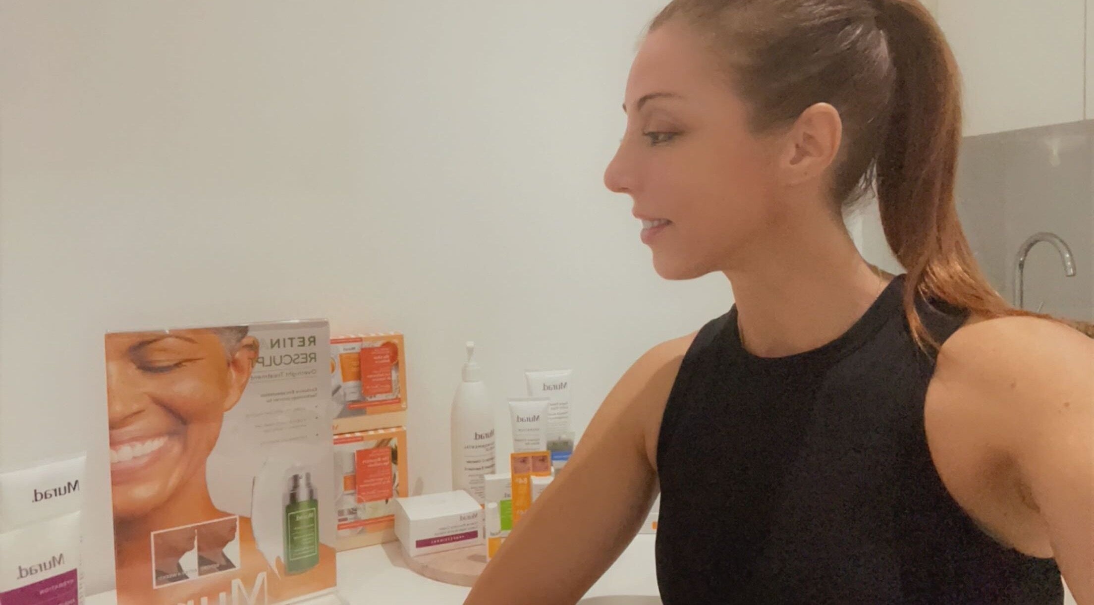 Aesthetic expert at Derma Matrix Aesthetics in Roselands, NSW, AU preparing skincare products.