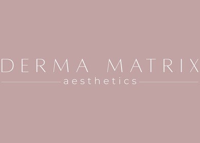 Elegant logo of Derma Matrix Aesthetics in Roselands, New South Wales, AU on a soft pink background.