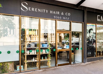 Front view of Serenity Hair & Co salon in Surry Hills, New South Wales, AU showcasing stylish glass windows.