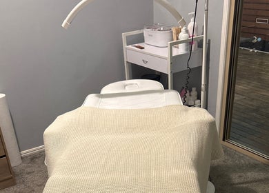 Cozy treatment room at Beauty Lounge By Lil, Meringandan, Queensland, AU featuring a comfortable massage bed.