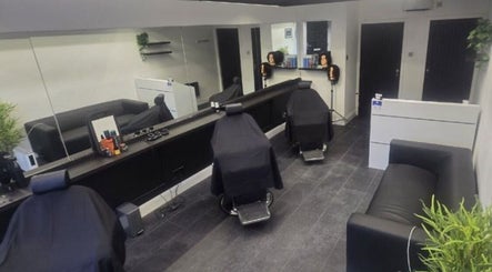 Modern salon interior at Yba.Blendz in Dunfermline, Scotland, GB with sleek design and comfortable seating.