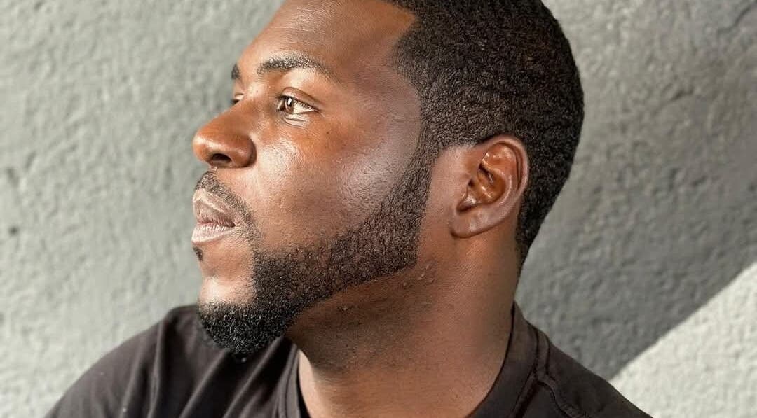 Modern haircut at Mapopotane Barbershop, Roodepoort, Gauteng, ZA, showcasing precise detailing.