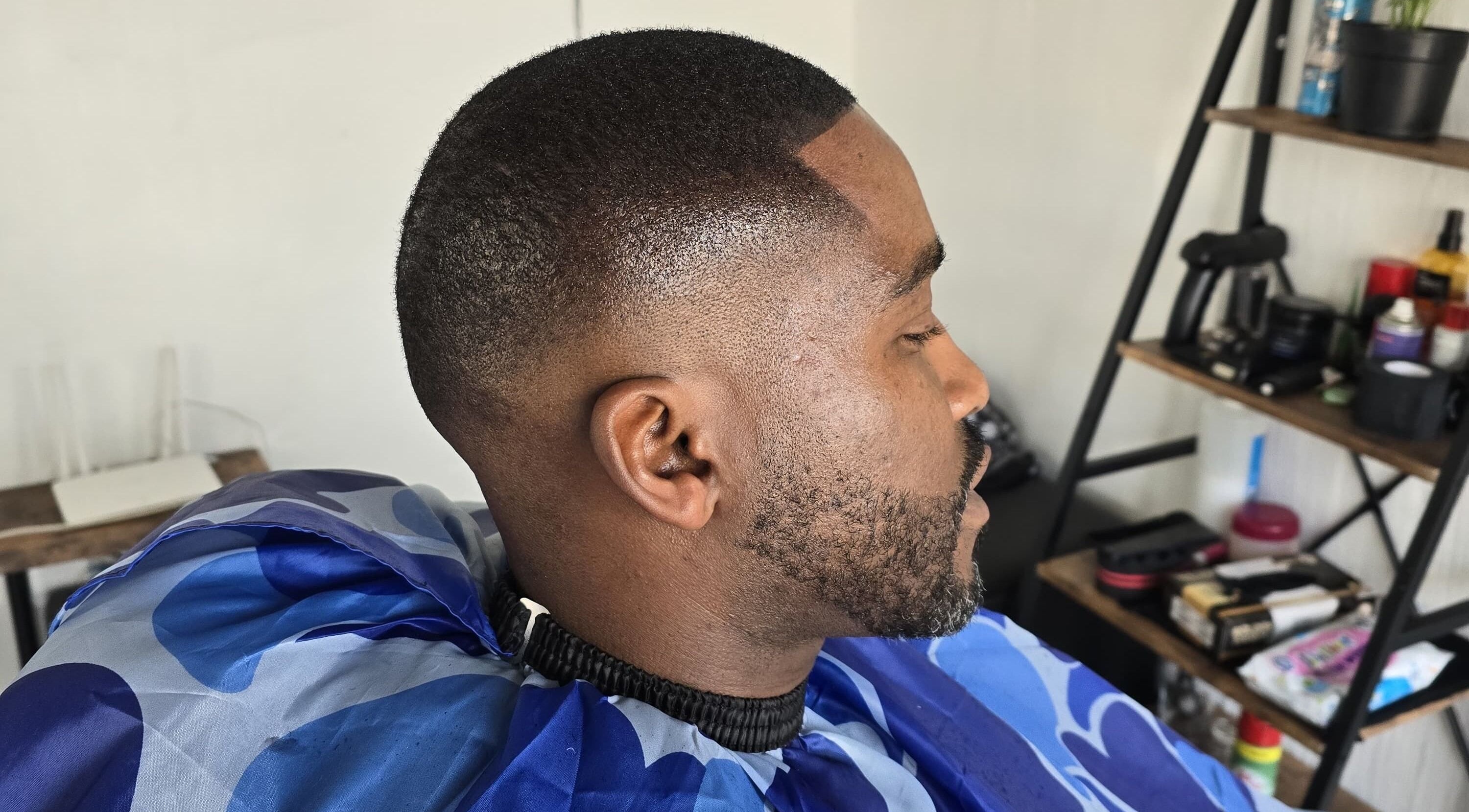 Close-up of a sharp fade haircut at Mapopotane Barbershop, Roodepoort, Gauteng, ZA.