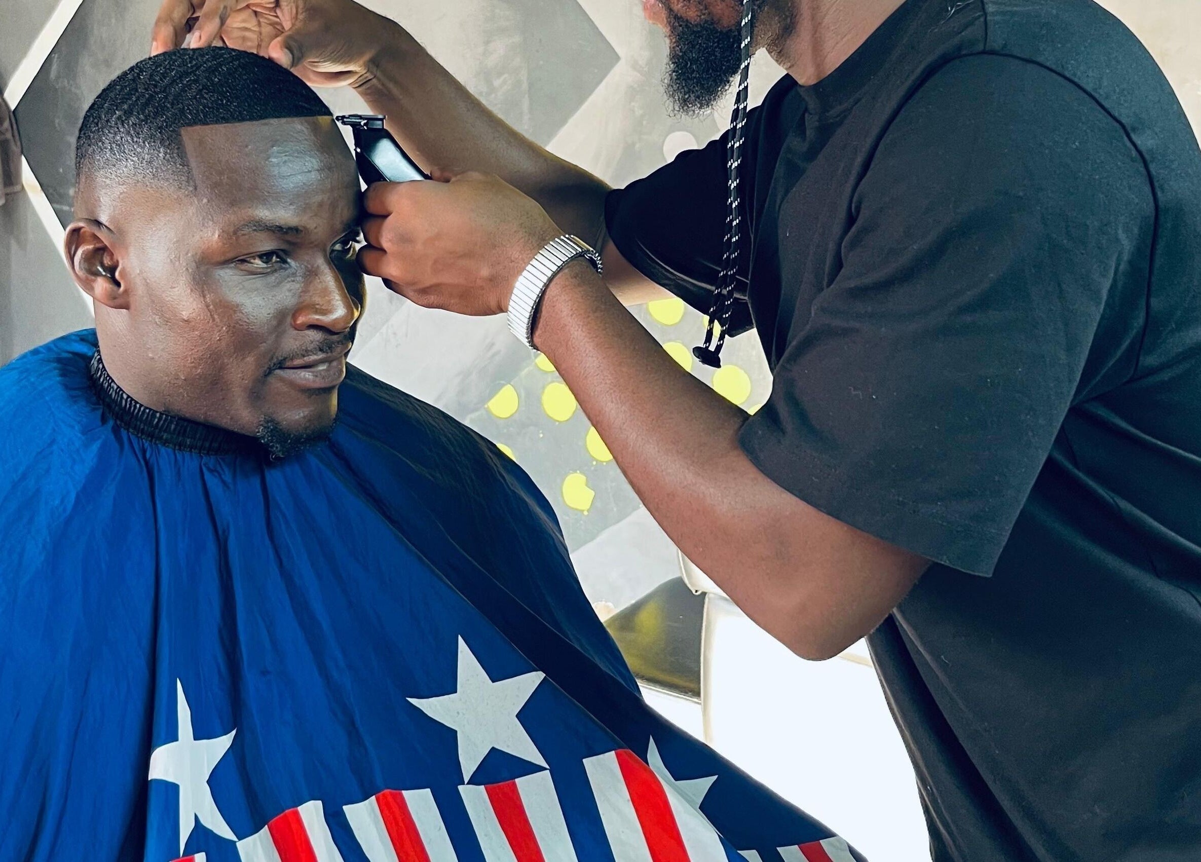 Barber expertly styling at Mapopotane Barbershop, Roodepoort, Gauteng, ZA