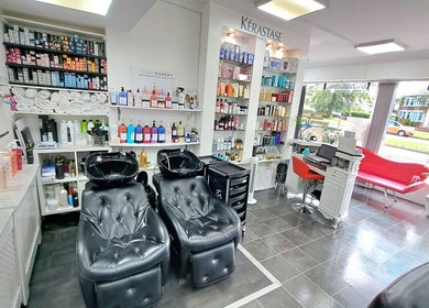 Relaxing salon space with hair product displays at CC Hair Studio, Oxford, England, GB.