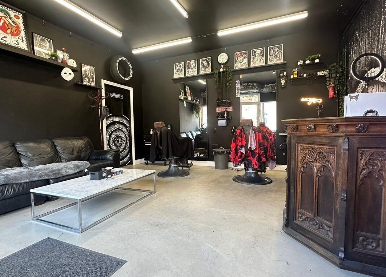 Modern interior of Rejects Barbers in Boldon Colliery, England, GB with stylish decor and seating.