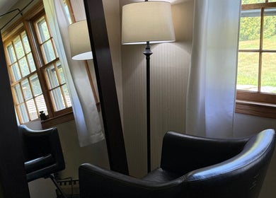 Elegant seating area with natural light at Flor & Fita, Ellington, Connecticut, US.